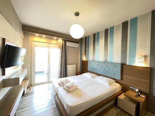 Katil atau katil-katil dalam bilik di Porto Del Sol Hotel