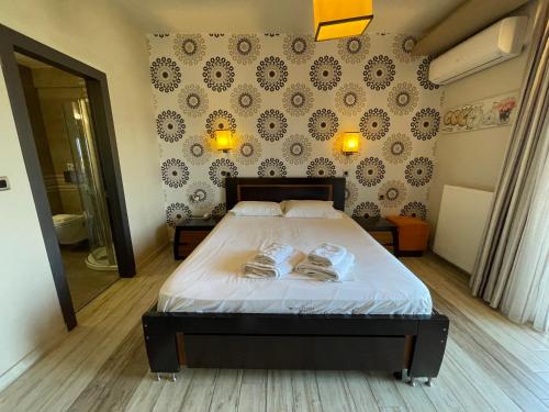 Katil atau katil-katil dalam bilik di Porto Del Sol Hotel