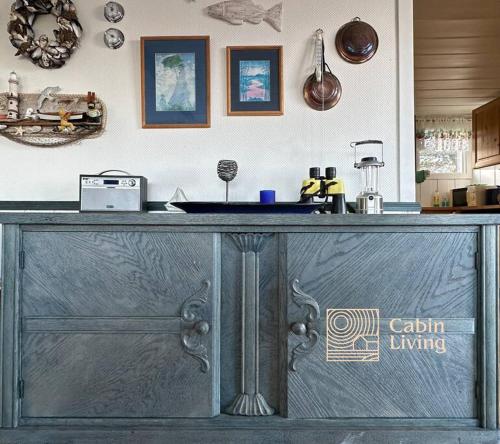 a counter in a kitchen with a counter top at Southern cottage with terrace and magnificent view in Lillesand