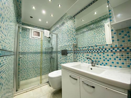 Ванная комната в Nokta Çalış Suit Apart, Fethiye, Ölüdeniz