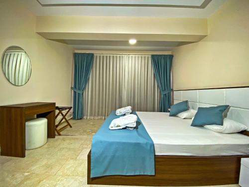 Postel nebo postele na pokoji v ubytování Nokta Nif Suit Apart, Fethiye, Ölüdeniz