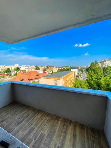 a balcony with a view of a city at Relax House in Craiova