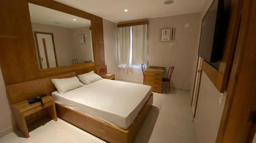 Katil atau katil-katil dalam bilik di Verona Hotel