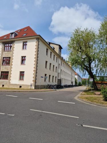 a building on the side of a street at Unterkunft Greifswald in Greifswald