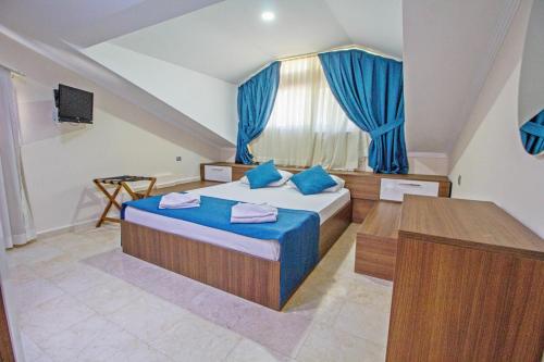 Postel nebo postele na pokoji v ubytování Nokta Faralya Suit Apart, Fethiye, Ölüdeniz