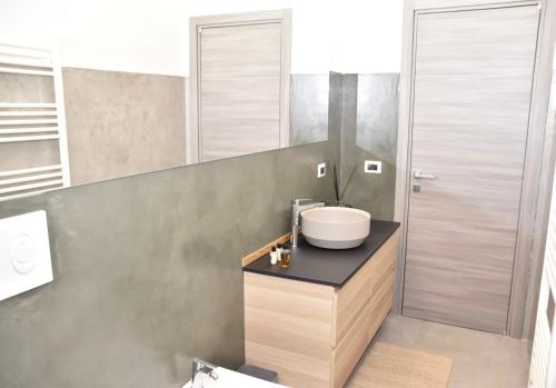a bathroom with a sink and a toilet in it at castel di sangro luxury home in Castel di Sangro