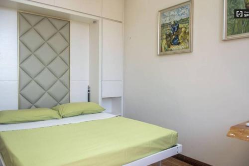 Posteľ alebo postele v izbe v ubytovaní Appartamento Appia Nuova Furio Camillo