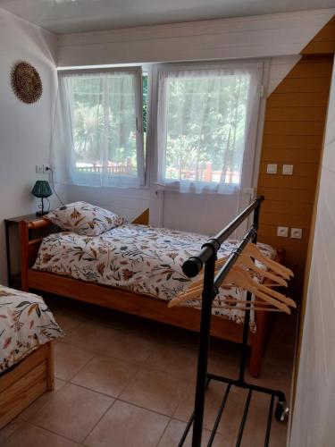 Postel nebo postele na pokoji v ubytování Gite de l'olivier