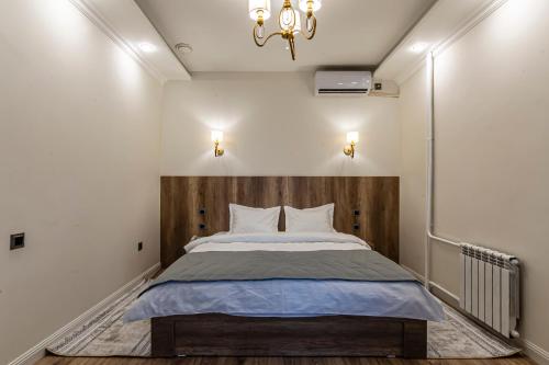 Katil atau katil-katil dalam bilik di Oscar Hotel by AG Hotels Group