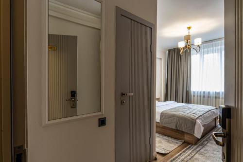 Katil atau katil-katil dalam bilik di Oscar Hotel by AG Hotels Group