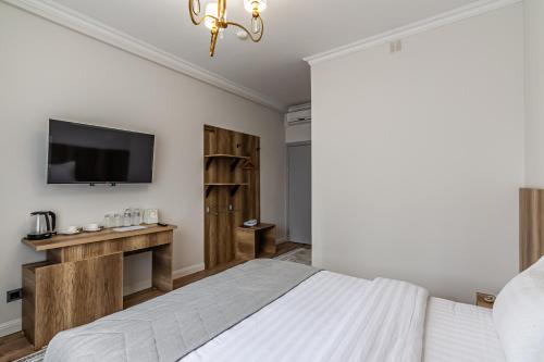 Katil atau katil-katil dalam bilik di Oscar Hotel by AG Hotels Group