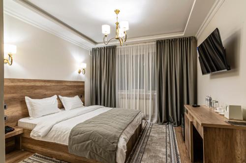 Katil atau katil-katil dalam bilik di Oscar Hotel by AG Hotels Group