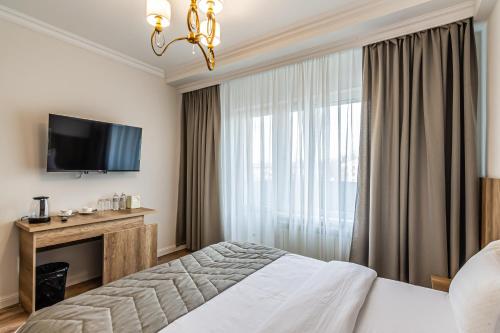 Katil atau katil-katil dalam bilik di Oscar Hotel by AG Hotels Group