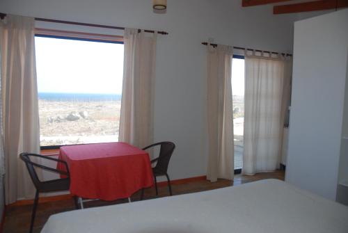 Ένα ή περισσότερα κρεβάτια σε δωμάτιο στο Cabanas Las Hualas