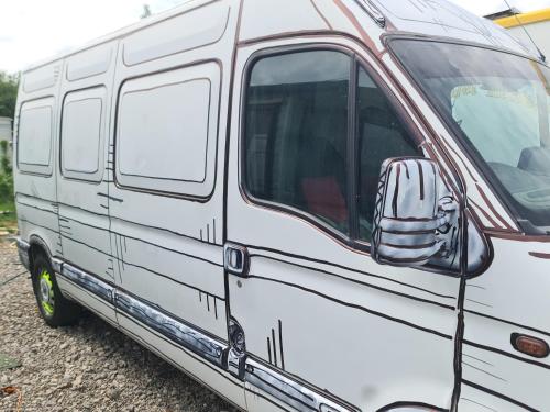 a white camper van parked on the gravel at Camper Niklas in Vama Veche