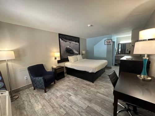 Super 8 by Wyndham Ocean Springs Biloxiにあるベッド
