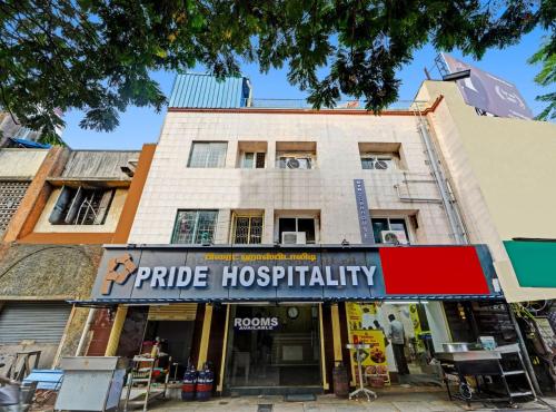 a building with a sign that reads pride hospitality at Collection O Pride Hospitality US Consulate in Chennai