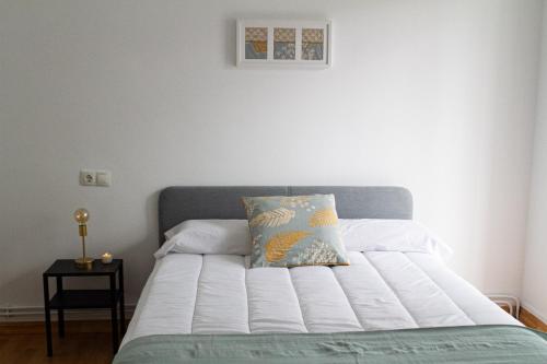 Postel nebo postele na pokoji v ubytování Muralla de Tata