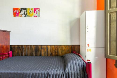 Una cama o camas en una habitación de Como en casa, Mendoza