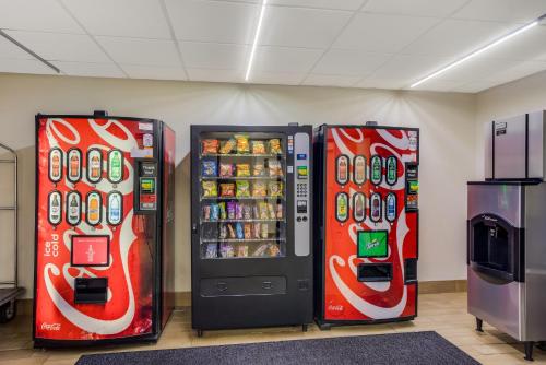 two soda machines are parked next to each other at Red Roof Inn Nashville - Music City in Nashville
