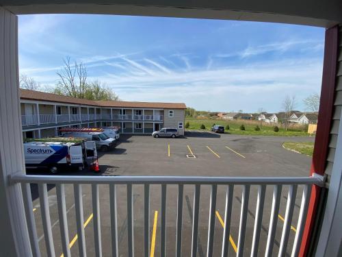 a view from a balcony of a parking lot at Stay Inn Niagara Falls Vacation Studios in Niagara Falls