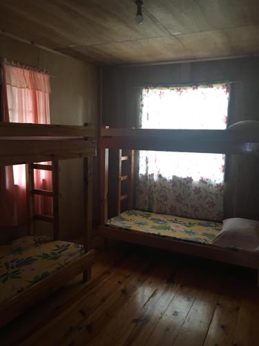 Postel nebo postele na pokoji v ubytování Vilma's Homestay