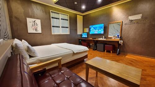 Palace Hotelにあるテレビまたはエンターテインメントセンター