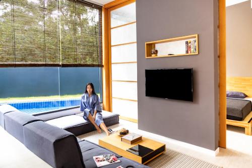 TV a/nebo společenská místnost v ubytování Villoft Zen Living Resort