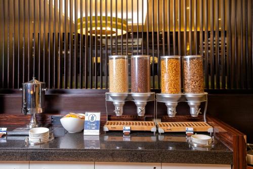 a bunch of food items on a counter in a restaurant at President Hotel in London