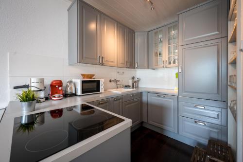Kuchyňa alebo kuchynka v ubytovaní Wohnung Seeblick