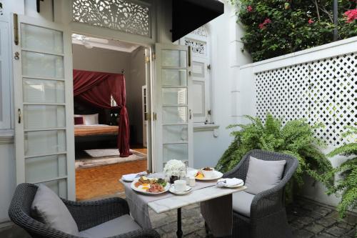Zona de estar de Maniumpathy Hotel