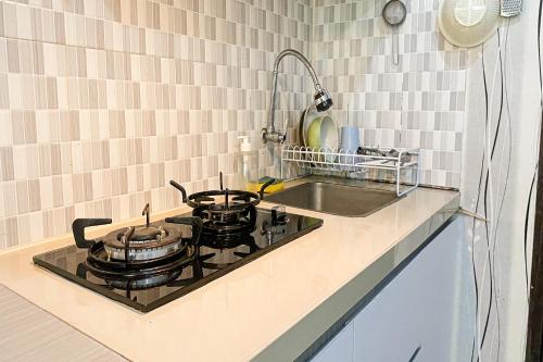 Kuchyň nebo kuchyňský kout v ubytování The Jarrdin Apartment by Tempat Singgah