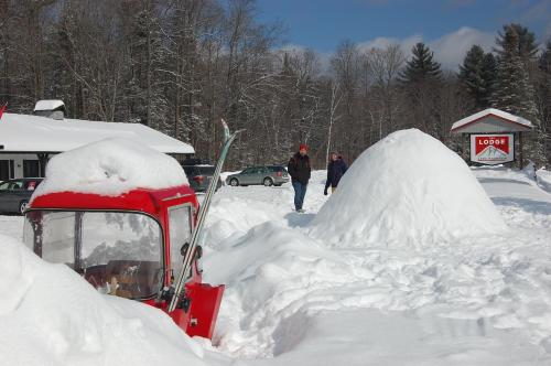 a pile of snow next to a snow mound at Gore Mountain Lodge in North Creek
