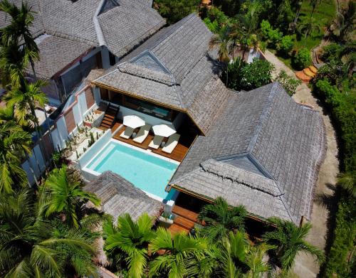 an aerial view of a house with a swimming pool at Villa Vara - Tropical Pool Villa in Ao Nang Beach
