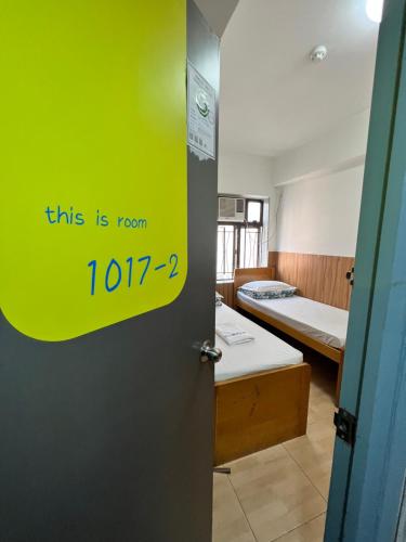 Katil atau katil-katil dalam bilik di Ah Shan Hostel