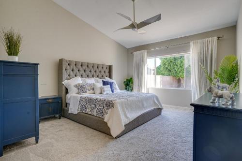 a bedroom with a large bed and a window at Phoenix Home with Private Pool, 16 Mi to Downtown! in Phoenix