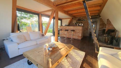 Zona de estar de Modern cottage, views and a jacuzzi