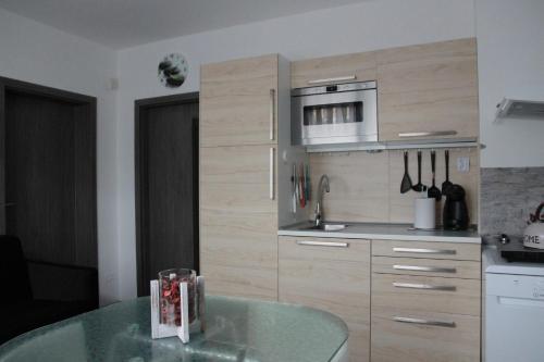 Kuchyň nebo kuchyňský kout v ubytování apartmán Relax Frymburk