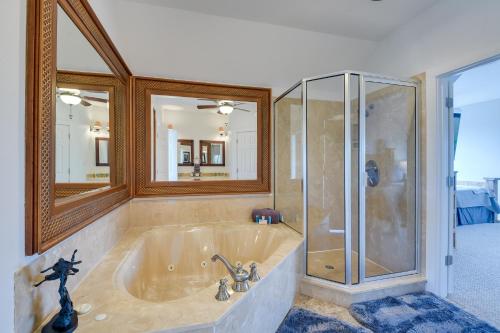 a large bathroom with a tub and a shower at Spacious Lake Granbury Vacation Rental with Dock! in Granbury