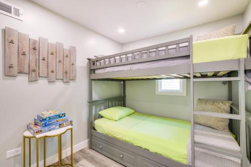 a bunk bed room with bunk beds in a house at Des Plaines Vacation Rental with Spacious Backyard! in Des Plaines