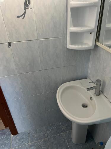 a bathroom with a toilet and a sink at Urban House Koukouroumas in Sykia Chalkidikis