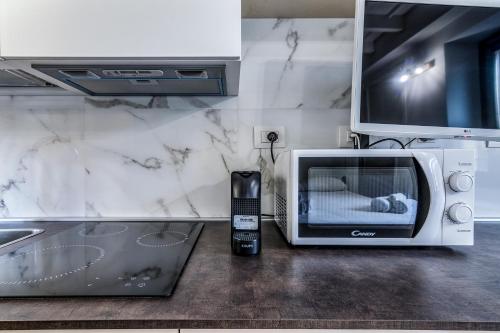 Kuchyňa alebo kuchynka v ubytovaní Morimondo Studio Apartment