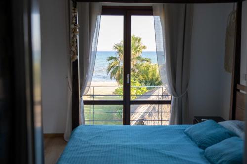 En eller flere senge i et værelse på Balinese