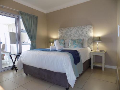 Postel nebo postele na pokoji v ubytování 2-bedroom Sea View Apartments