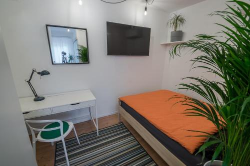 Μια τηλεόραση ή/και κέντρο ψυχαγωγίας στο POMODORO ROOMS