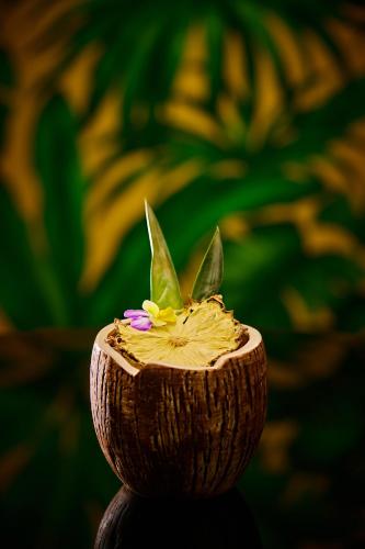 a close up of a piece of food in a coconut at Mystery Hotel Budapest, Preferred Hotels & Resorts in Budapest