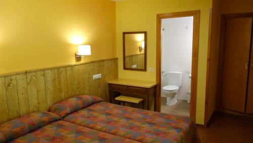 Кровать или кровати в номере Hotel Vicente