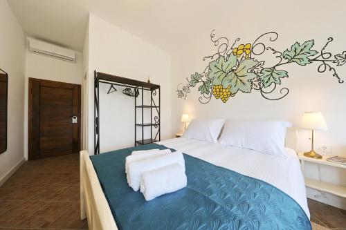 Postel nebo postele na pokoji v ubytování Wine Paradise