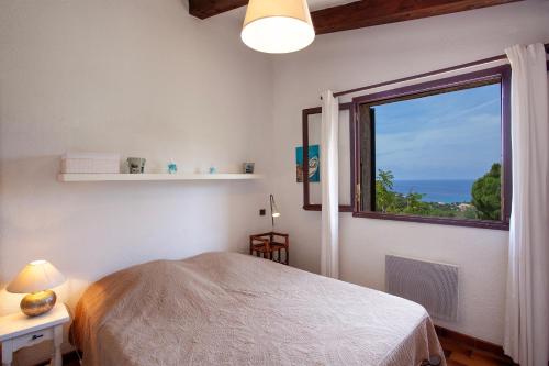 Postel nebo postele na pokoji v ubytování Davia 2 - Grande terrasse vue mer