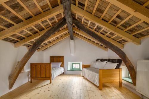 Ένα ή περισσότερα κρεβάτια σε δωμάτιο στο Karst Heritage Retreat